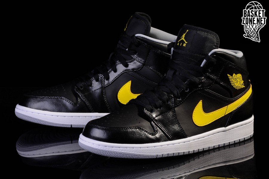 black and yellow jordan 1's