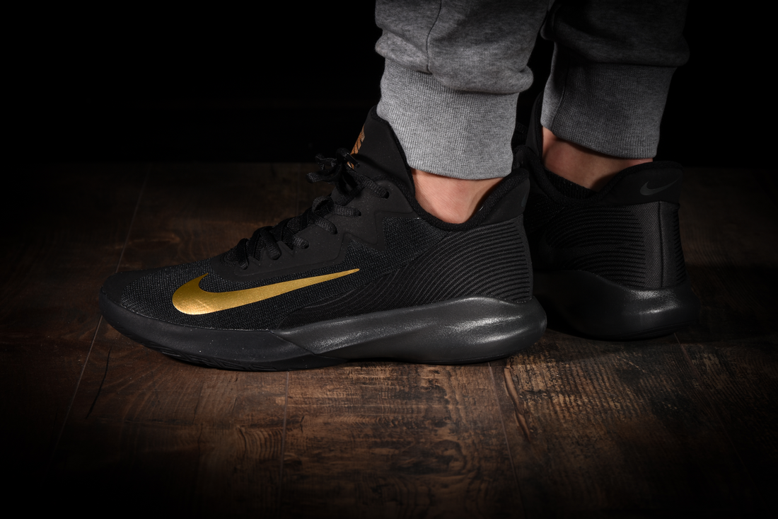 nike precision iv black metallic gold